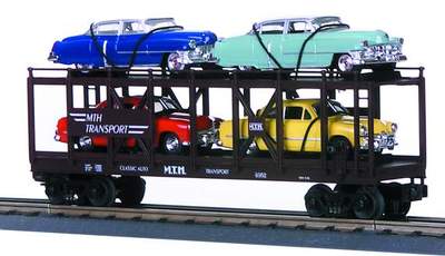 MTH Railking 30-7628 MTH Auto Transportation Car no. 4952 -  w/(2) '49 coupes and (2) '55 coupes 1963 O SCALE Like New