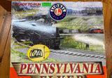 Lionel 6-30018 Pennsylvania Flyer  Set O SCALE (7 stakes are missing from flat car) Used Damaged Box