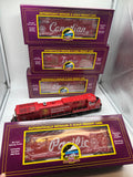 MTH 20-21161-1, 20-92237 Canadian Pacific CP Holiday Train Diesel Engine w/Proto-Sound 3.0 and 4-Car Set 50' Dbl. Door Plugged Boxcar (Set of 1 engine, 4 cars) Lighted O Scale Limited Edition Like New