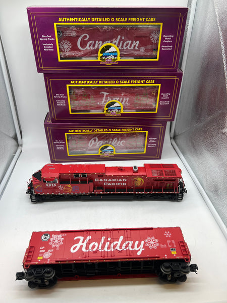 MTH 20-21161-1, 20-92237 Canadian Pacific CP Holiday Train Diesel Engine w/Proto-Sound 3.0 and 4-Car Set 50' Dbl. Door Plugged Boxcar (Set of 1 engine, 4 cars) Lighted O Scale Limited Edition Like New