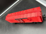 Lionel 6-26288 AEC glow in the dark boxcar red/pink O SCALE Like New