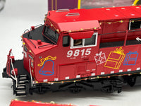 MTH 20-21161-1, 20-92237 Canadian Pacific CP Holiday Train Diesel Engine w/Proto-Sound 3.0 and 4-Car Set 50' Dbl. Door Plugged Boxcar (Set of 1 engine, 4 cars) Lighted O Scale Limited Edition Like New