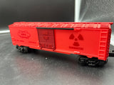 Lionel 6-26288 AEC glow in the dark boxcar red/pink O SCALE Like New