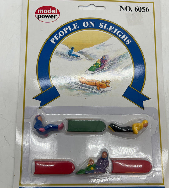 Model Power People on sleighs O SCALE NEW