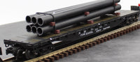 Atlas 9331-1 52.5ft. flat car with pipe load O SCALE Like New
