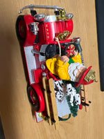 Hallmark 1996 North Pole Volunteers, Magic --Firefighter Santa & Dalmartion on Firetruck Ornament  Used Excellent