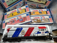 Lionel 6-1776, 6-7600, 6-7601, 6-7602, 6-7603, 6-7604, 6-7605, 6-7606, 6-7607, 6-7608, 6-7609, 6-7610, 6-7611, 6-7612, 6-7613 Spirit of 76 Locomotive, Caboose, and Box Car Set (Set of 15 Pcs) O Scale NEW