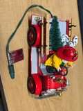 Hallmark 1996 North Pole Volunteers, Magic --Firefighter Santa & Dalmartion on Firetruck Ornament  Used Excellent