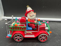 Enesco 573523 1991 Hot stuff Santa Firefighter Fire Truck Ornament  Used Excellent