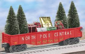 his gondola carries a festive load of Christmas trees and gifts to boys and girls everywhere.  FEATURES: Load includes four trees and five presents Die-cast metal sprung trucks and operating couplers PRODUCT SPECIFICATIONS Rail Line: North Pole Central Gauge: Traditional O Gauge  Brand: Lionel Min Curve: O-27 Dimensions: Length: 10 1/4" Most Recent Catalog: 2006 Lionel Christmas Catalog