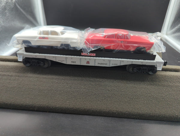 Lionel 6-52184, Monopoly 'Free Parking' flat car with 2 autos, 1999 (M-0021) O SCALE Like New