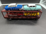 MTH Railking 30-7628 MTH Auto Transportation Car no. 4952 -  w/(2) '49 coupes and (2) '55 coupes 1963 O SCALE Like New