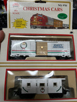 closeup of boxcar and caboose